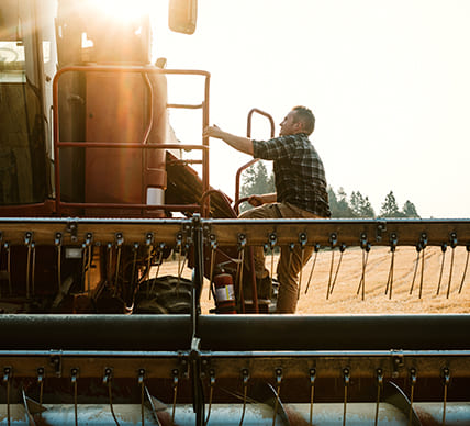 farmer on equipment