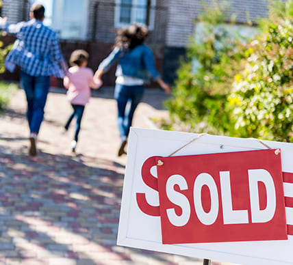 sold sign outside home
