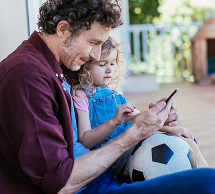 father and daughter on phone